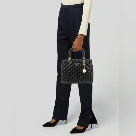 St. John Women's Black Leather Quilted Handbag
Purse Gold Tone hardware W/ Charm - Picture 2 of 16